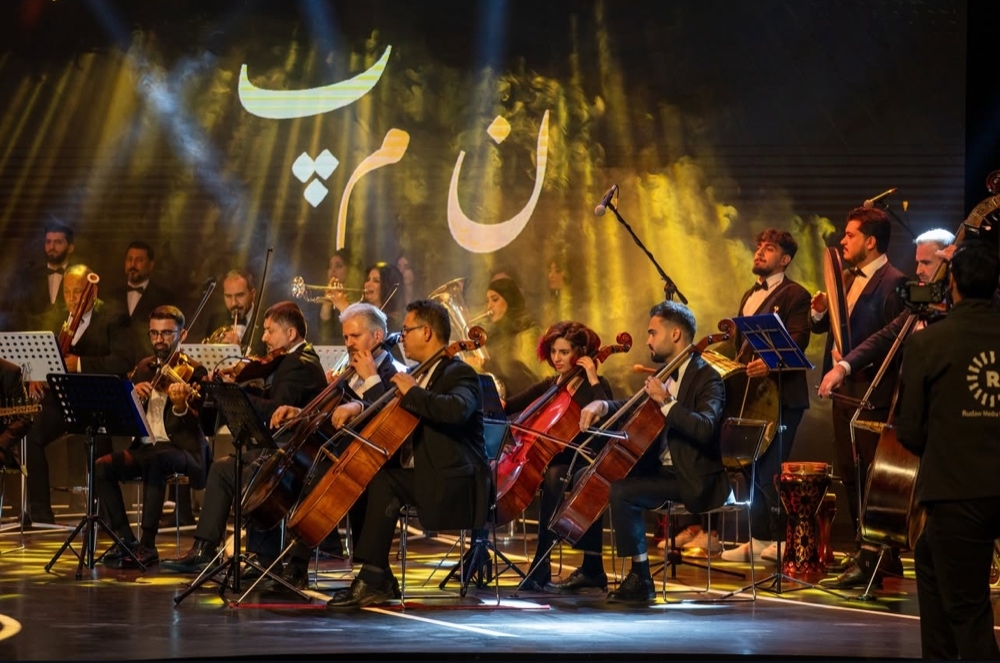An orchestra performing at a Rwanga-supported concert